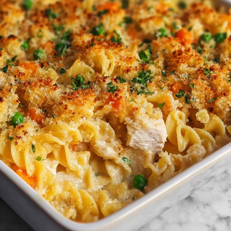 Creamy Chicken Noodle Casserole With Mushrooms, Cheddar, and Ritz Cracker Topping Recipe